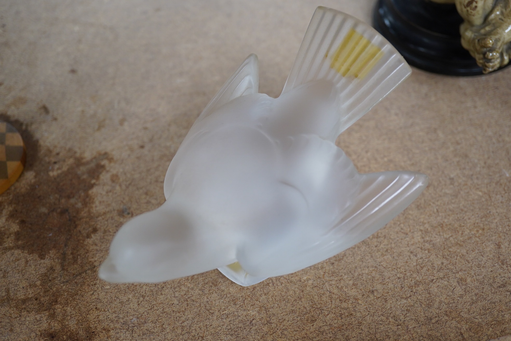 A modern Lalique glass bird, signed to the base, 14cm high. Condition - good